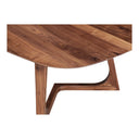 Close up angle view of Donald coffee table edge showing smooth walnut finish and bracket legs