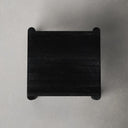 Top down view of Axton square coffee table showing charcoal black wood grain tabletop surface