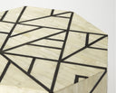 Macro view of Alessandro table top showing bone inlay mosaic tile texture and black geometric lines