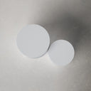 Top-down view of the Cohen End Table set showing the circular white tabletops arranged side by side.