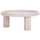 Dennis round white wash wood tray top coffee table three-quarter studio view showcasing chunky cylinder legs