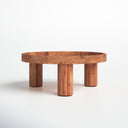 Dennis round natural wood tray top coffee table alternative three-quarter studio view