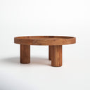 Dennis round natural wood tray top coffee table low-angle studio view
