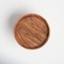 Top down view of Dennis round coffee table showing natural wood grain tray top surface