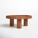 Dennis round natural wood tray top coffee table straight-on side view showing three cylinder legs
