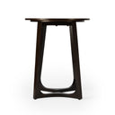 Gideon dark brown wood round end table with intersecting base straight front studio view