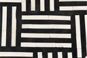 Macro view of Reign table top showing basketweave bone inlay texture and black resin