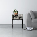 Reign black and white bone inlay chevron stripe 1 drawer end table styled in a room