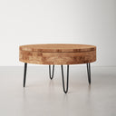 Keith round natural wood storage coffee table alternative low-angle studio view