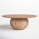 Nixon round natural wood coffee table three-quarter studio view showcasing spherical ball pedestal base