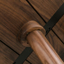 Macro view of Jaden table underside showing tapered leg screw mounting joint