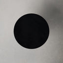 Top down view of Boston round coffee table showing black wood grain tabletop surface