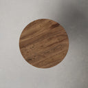 Top down view of Boston round coffee table showing rich walnut wood grain tabletop surface