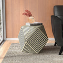 Josue black and white bone inlay hexagonal drum table styled on a grey rug