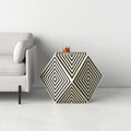 Josue black and white bone inlay geometric chevron stripe hexagonal drum end table styled next to a couch