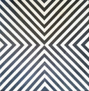 Macro view of Josue tabletop showing black and white geometric bone inlay pattern