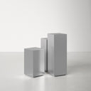 Karson brushed metal pedestal nesting tables styled in a modern room