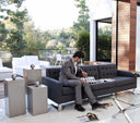 Karson brushed metal pedestal nesting tables styled on a modern luxury patio