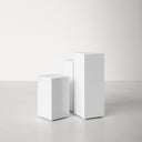 Karson 3 piece white minimalist pedestal nesting table set alternative front studio view