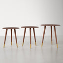 Three Kayson Solid Wood End Tables arranged in a row on a light wood floor, with matching round tops and metallic leg accents.