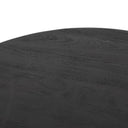 Full frame macro swatch of dark charcoal black wood grain texture on Alberto nesting coffee table surface
