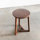 Top down angle view of Martin round end table showing dark brown wood grain tabletop surface
