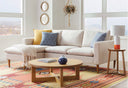 Martin solid wood round end table and matching cross base coffee table styled in a living room