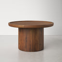 Paxton round dark walnut wood pedestal coffee table low profile studio angle view