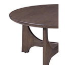Close up view of Skyler coffee table showing rounded tabletop edge and walnut brown wood grain base