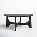 Skyler round black wood coffee table alternative three-quarter studio view