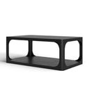 Kingsley rectangular black wood coffee table three-quarter studio view showcasing open shelf and rounded cutout frame