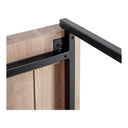 Macro view of Tate table underside showing black metal frame screw assembly joint