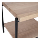 Macro view of Tate table corner showing light wood tray and black metal leg joint