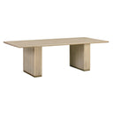 Tripp 6 Seater Dining Table shown from an angled front view, highlighting its rectangular solid wood tabletop and two fluted pedestal bases.