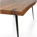 Close up angle view of Walden coffee table showing natural live edge corner and wood grain