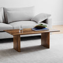 Scott rectangular wood coffee table with slab panel legs styled in a modern living room