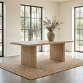 Nixon Rosa Plank 6 Seater Dining Table in a light natural wood finish styled in a bright contemporary dining room.