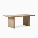 Nixon Rosa Plank Dining Table featuring a rectangular wooden tabletop and two substantial panel-style legs in a natural finish.