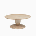 Leandro round natural wood coffee table three-quarter studio view showcasing stacked goblet pedestal base