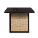 Front view of the Dennis Woven 6 Seater Dining Table showing its clean-lined black frame and natural woven panel detailing.