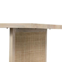 Front-facing view of the light Dennis Woven Dining Table showing its woven panel base and substantial wooden top.