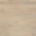 Close-up of the pale wooden tabletop on the Dennis Woven Rectangle Dining Table showing its smooth grain and substantial edge.